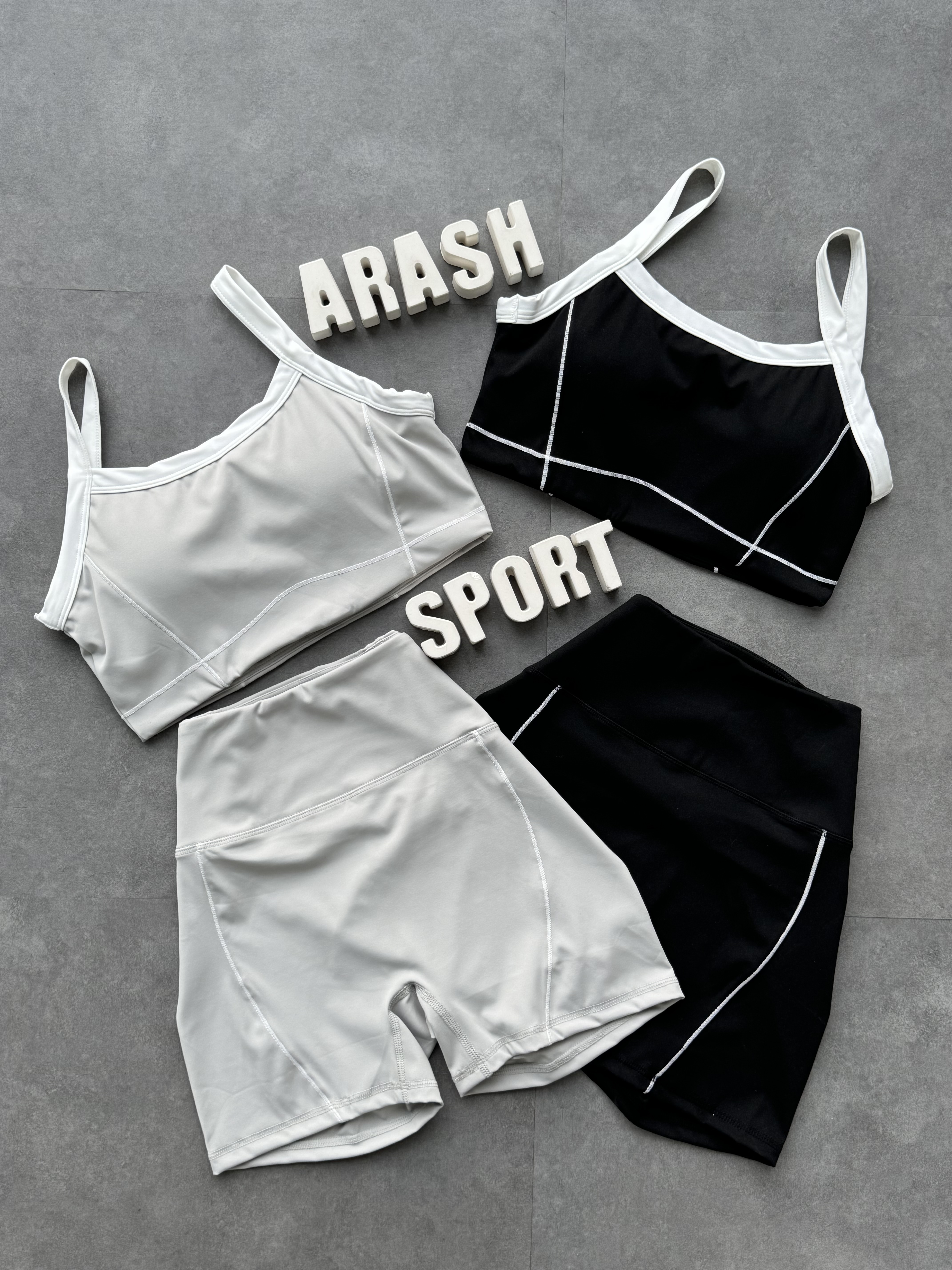 نیم تنه و بایکر مشکی و طوسی باشگاه بدنسازی زنانه 